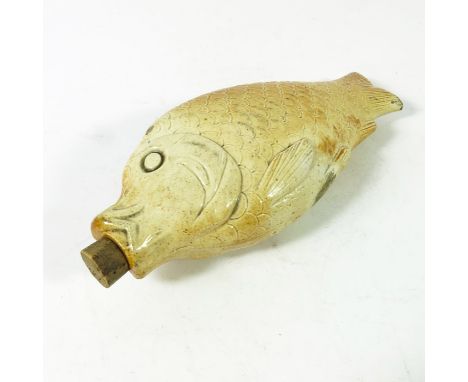 A salt glazed stoneware fish flask, 19th century, realistically modelled in relief, 19cm long