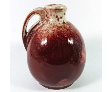 William Howson Taylor for Ruskin, a high fired flagon, 1933, white over red with green spotting, impressed marks and incised 