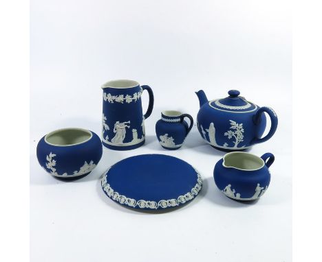 An Adams Jasperware tea service, including teapot and stand, bowl and three jugs, blue with white relief moulded Neoclassical