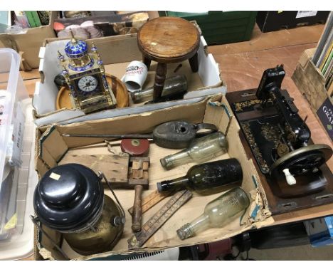 Two trays of assorted, to include an oil lamp and a sewing machine etc.