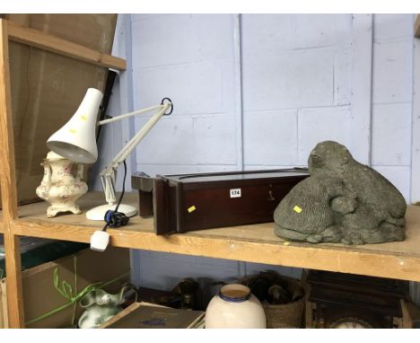 An angle poise lamp and wall clock etc.