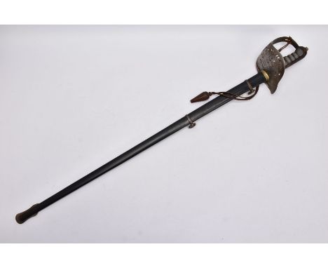 A VICTORIAN 1897 PATTERN OFFICERS SWORD, with metal scabbard and brown leather 'portipee', the handguard has the VR cypher an