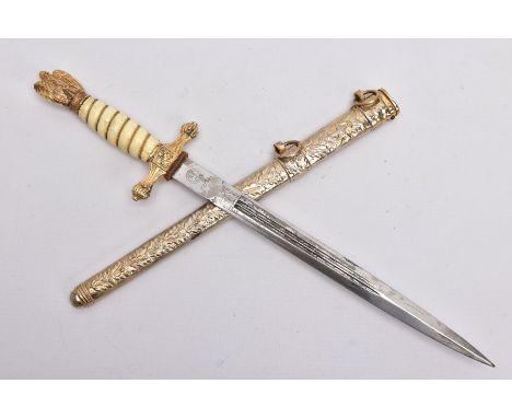 A POST WWII COPY OF A GERMAN KRIEGSMARINE OFFICERS DAGGER, blade has a circular RZM logo with M7/36 etched at riccaso, poor q