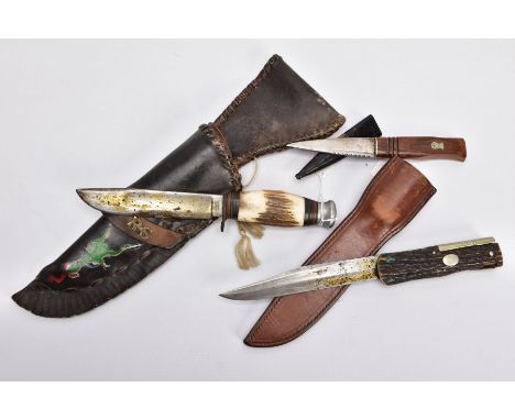 A BOX CONTAINING TWO CAMPING STYLE KNIVES AND SCABBARDS fake bone handles, etc and a Scottish 'Sgian Dubh' in a small black l