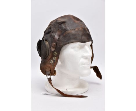 A FIRST PATTERN WWII RAF FLYING HELMET IN LEATHER, believed 1st style with three stud fasteners as side, No.1 stud missing on