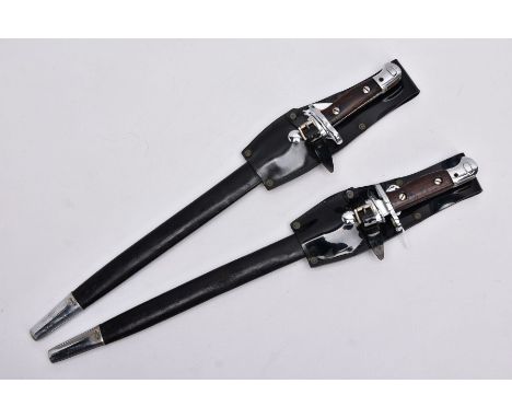 TWO X 1907 PATTERN SMLE DRESS BAYONETS in high gloss belt frogs and scabbards, grips are wooden with chromed fittings and bla