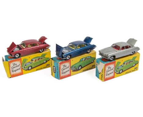 3x Corgi Toys Jaguar Mk.X (238). An interesting group of Jaguar Mk.Xs in different finishes. An example in silver with red in