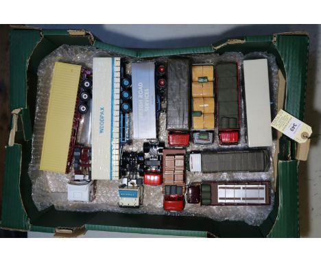 10 Corgi Trucks. Ex-Display Models. Scania 113M Tractor Unit with a Curtainside semi-trailer. In Woodpax livery. A MAN Tracto