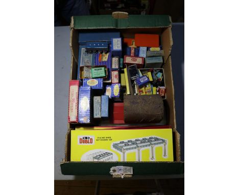 A quantity of Hornby Dublo accessories and lineside equipment, buildings, etc. Including; 2x Engine Shed kits (5005). 2x Engi