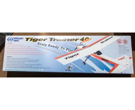 A Thunder Tiger Tiger Trainer 40 Mk.II (4523) radio controlled aircraft with 1549mm wingspan. Body in wood and plastic and re