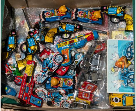 A quantity of Small Tinplate Vehicles and other items. Vehicles include Police, Fire, Ambulance, Taxi etc. Plus larger scale 