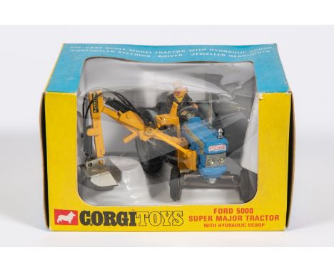 A Corgi Toys Ford Super Major Tractor with Hydraulic Scoop (74). Tractor in blue with yellow arm and scoop. Boxed with inner 