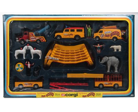 A Corgi Pinder Circus set (48). Comprising 3x vehicles and 2x trailers in Pinder Jean Richard livery. Circus Master, performe