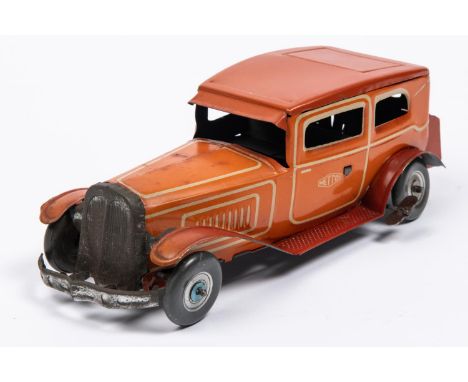 A 1930's style Mettoy tinplate clockwork 2 door saloon car. In orangey red with cream line detailing, 2 piece tinplate wheels