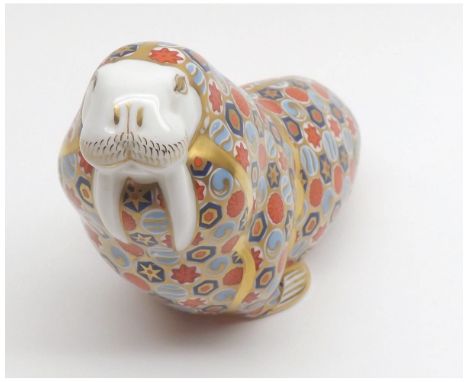 Royal Crown Derby Paperweight of a Walrus, (silver button), 4" high  