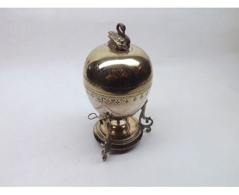 A late 19th or early 20th Century Silver Plated Mappin & Webb Egg-shaped Coddler, raised on three swept legs with central bur