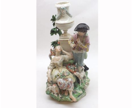Derby Porcelain large group of male figure playing a piccolo and his swooning female companion, also with dog and sheep at fo