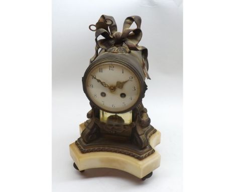 A second half of 19th Century French gilt Brass and marble mounted Clock, the drum shaped case surmounted by an elaborate rib