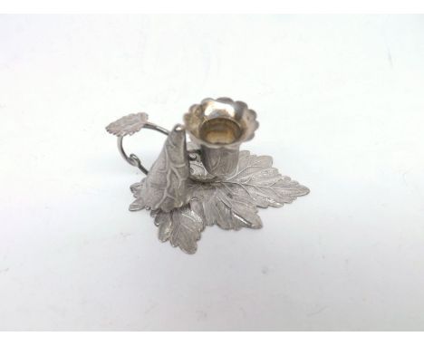 A Miniature Victorian Chamber Stick and Snuffer of foliate form, fitted with looped handle, hallmarked Birmingham 1843, Maker