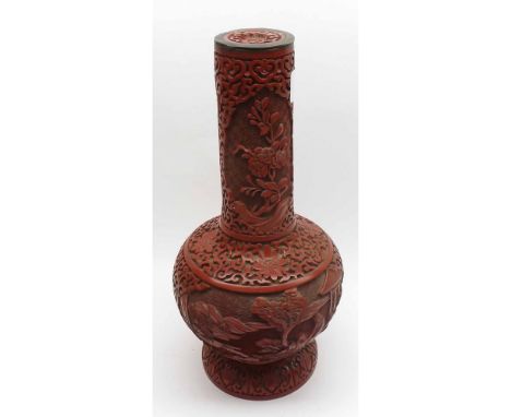 An Oriental Lacquered Lamp Base with reticulated decoration, panels of scenes and figures and scrolls etc, 12" high 