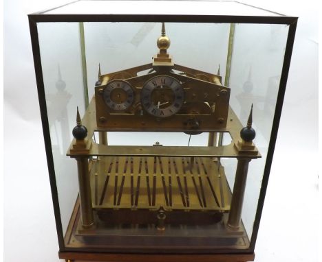 A late 20th Century scratch built "Congreve" rolling ball Clock, the square Brass framed and glazed lift off cover to a movem