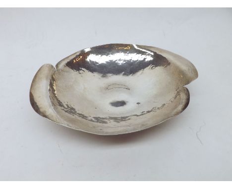 A 20th Century Hammered Silver Nut Dish of abstract form, marked "Sterling" to reverse, 6 1/4 oz  