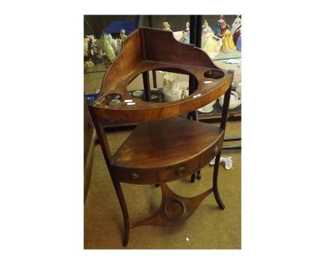 Georgian Mahogany corner Washstand of typical form, with galleried back over a three shelf body with central short drawer, ra