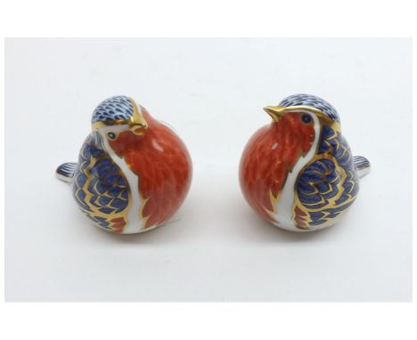 Two Royal Crown Derby Paperweights: Robins (one with chipped beak and missing button, the other with gold button), 2 3/4" hig