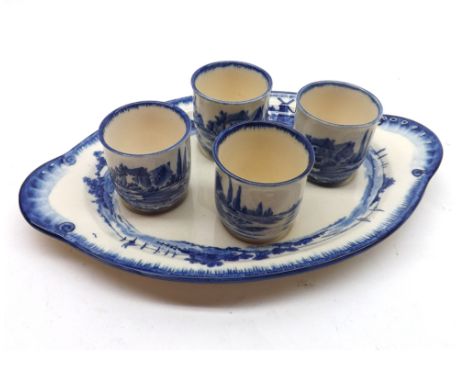 A Royal Doulton Norfolk Pattern blue Egg Cruet, the oval double-handled base with four removable cups, base Reg No 251612/597