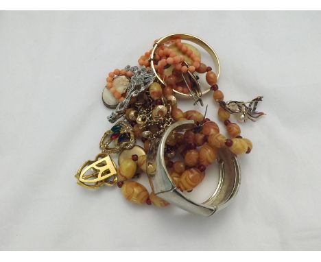 Packet of assorted jewellery items including white metal and Pearl Brooch, two Bangles, Ivory carving etc  