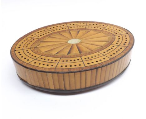An unusual George III Satinwood and mother-of-pearl inlaid Oval Cribbage Board and Card Holder, raised on four small turned f