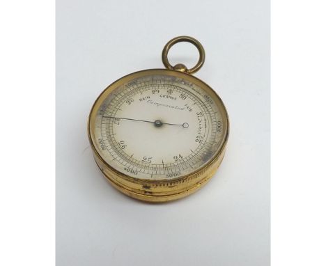 An early 20th Century lacquered Brass combination Pocket Altimeter/Barometer of typical circular form with bow suspension and