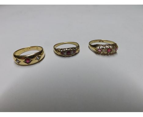 Group comprising an early 20th Century hallmarked 18ct Gold Ring set with a centre Ruby and two small Pearls in gypsy style, 