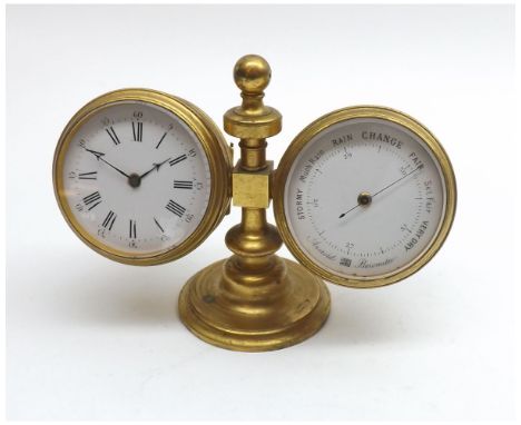 Early 20th Century French gilt Brass cased Desk Compendium, the central turned column on spreading circular foot, and flanked