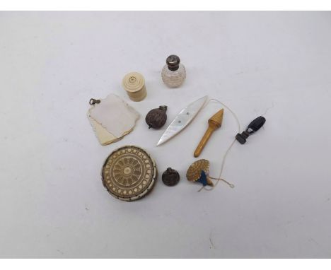 A Mixed Lot: Ivory or Bone Mounted Pin Cushion, small mother-of-pearl mounted Notebook, Miniature Glass Scent Bottle, small I