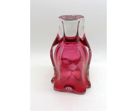 A clear and cranberry Art Glass Vase of abstract form, unsigned, circa 20th Century, 9" high 