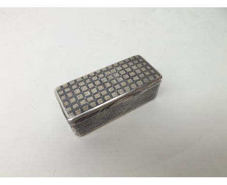 A 19th Century Russian Silver and Niello work Snuff Box of rectangular form, the hinged lid and body decorated with geometric