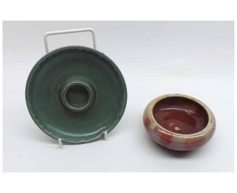 A small Chinese Bowl of compressed circular form, decorated in the Sang de Boeuf manner, incised to seal mark (foot chip); to