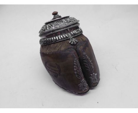 An unusual Metal Mounted Hoof Snuff Box, the pierced hinged lid (damaged) over a white metal mounted hoof decorated with appl