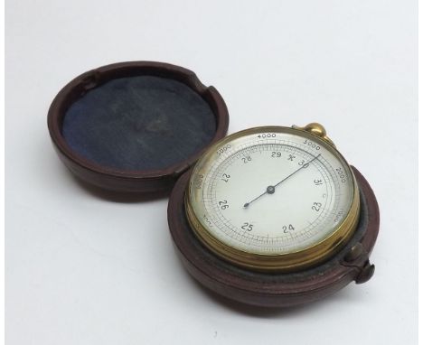 Early 20th Century Brass cased combination Pocket Barometer/Altimeter of typical circular form with bow suspension to a silve