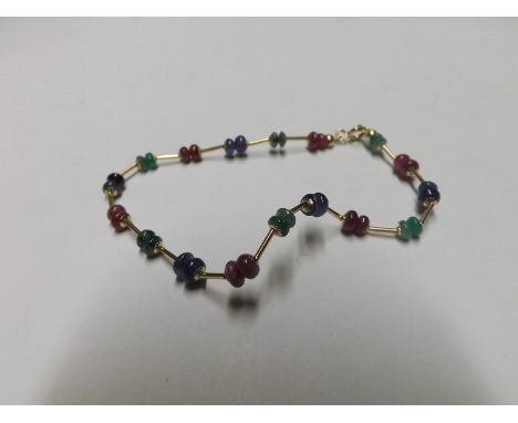 High grade precious metal Sapphire, Ruby and Emerald bead mounted Bracelet stamped "750"   