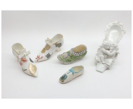 Pair of late 19th/early 20th Century Royal Worcester models of Shoes together with a further Crested Ware Shoe decorated with