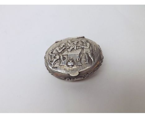An early 20th Century German Hanau Silver Snuff Box of oval hinged form, the lid decorated with a tavern scene, import marks 