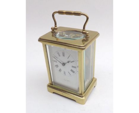 An early 20th Century French lacquered Brass Carriage Timepiece, the cylinder escapement to a Roman enamel dial with outside 