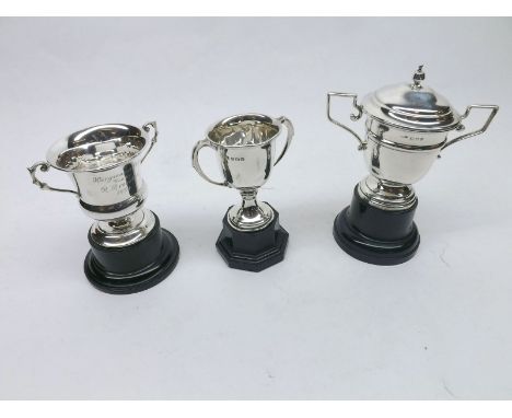 A Mixed Lot of three 20th Century small Silver Double-Handled Trophy Cups on plinth bases, largest 6" high, various dates and