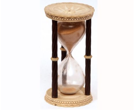 A 19th Century Hourglass Sand Timer, turned ivory ends, supported by three turned treen columns, 11 1/2" high  