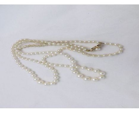 Cased Lotus twin strand graduated Pearl type Necklace with Pearl mounted clasp  