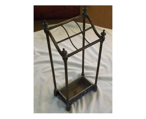 Small Brass Stick Stand of rectangular form with six sub-divisions and base tray, 12" wide  