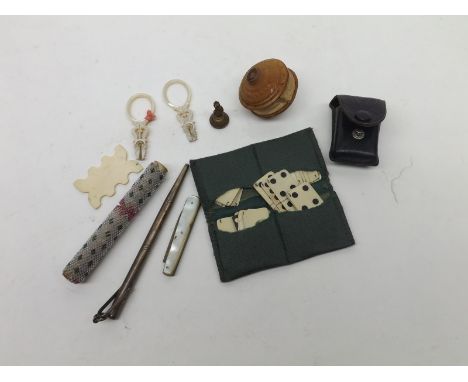 A Mixed Lot comprising: a Silver Propelling Pencil, Miniature Mother-of-Pearl Handled Pocket Knife, Needle Case with beaded d