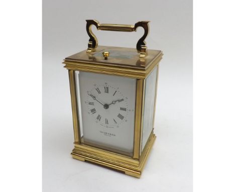 A late 20th Century English lacquered Brass repeating Carriage Clock, retailed by Taylor & Bligh - England, the lever platfor
